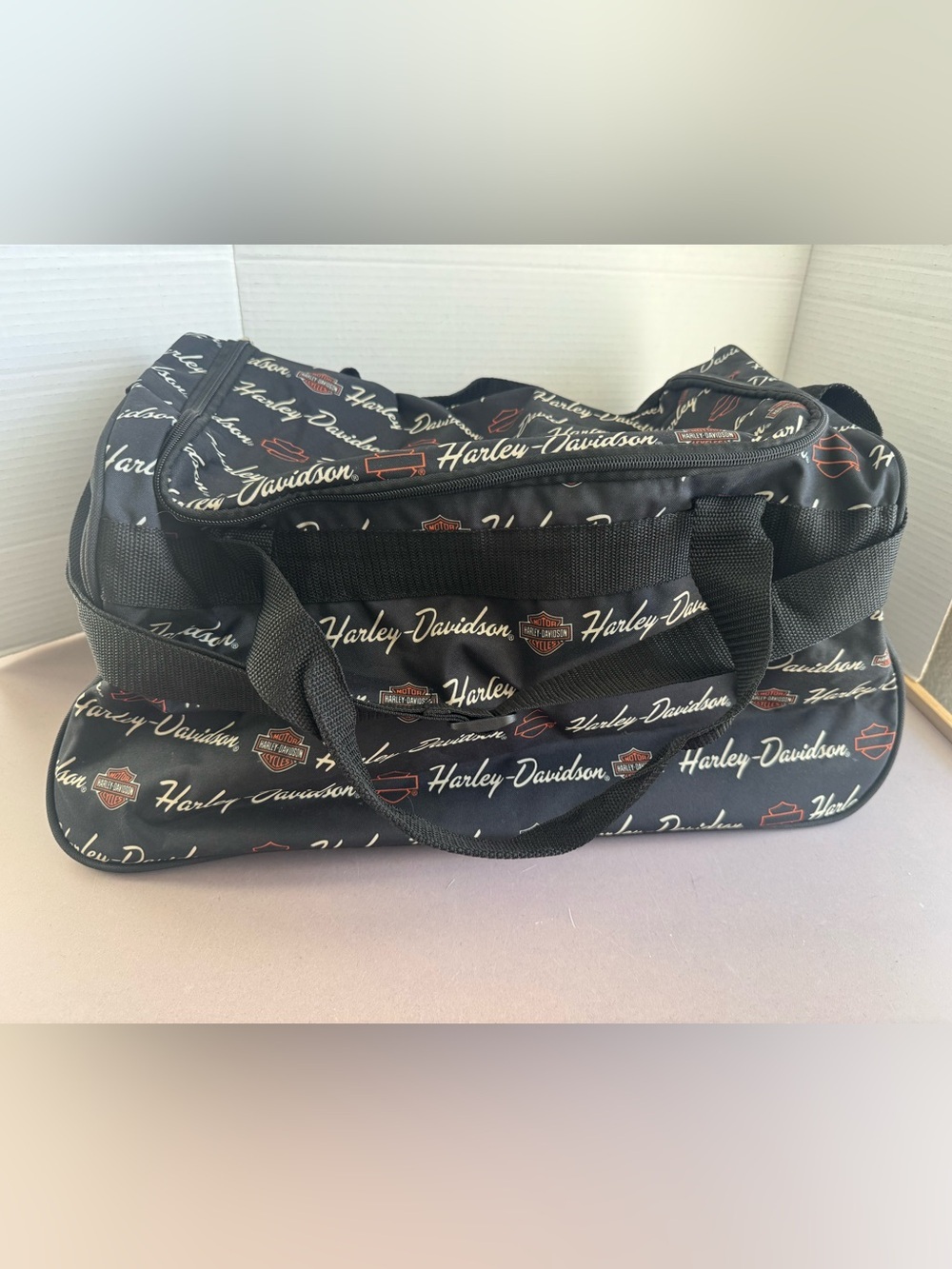 Harley-Davidson Black Duffel with White Script and Orange Accents
